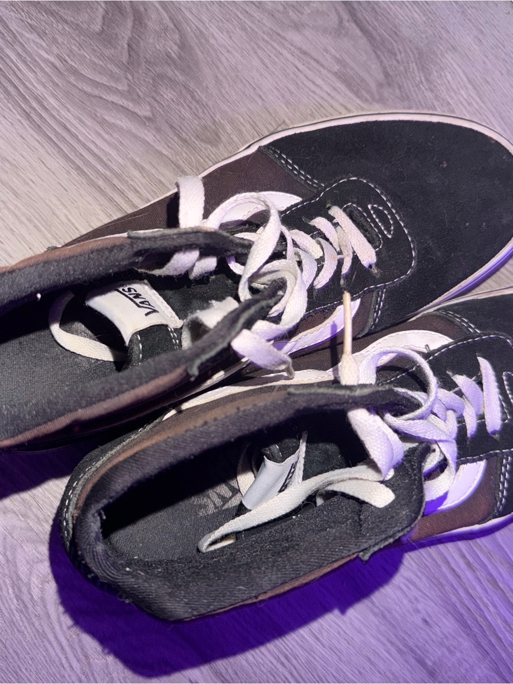 Vans Black and White High-Top Skate Sneakers